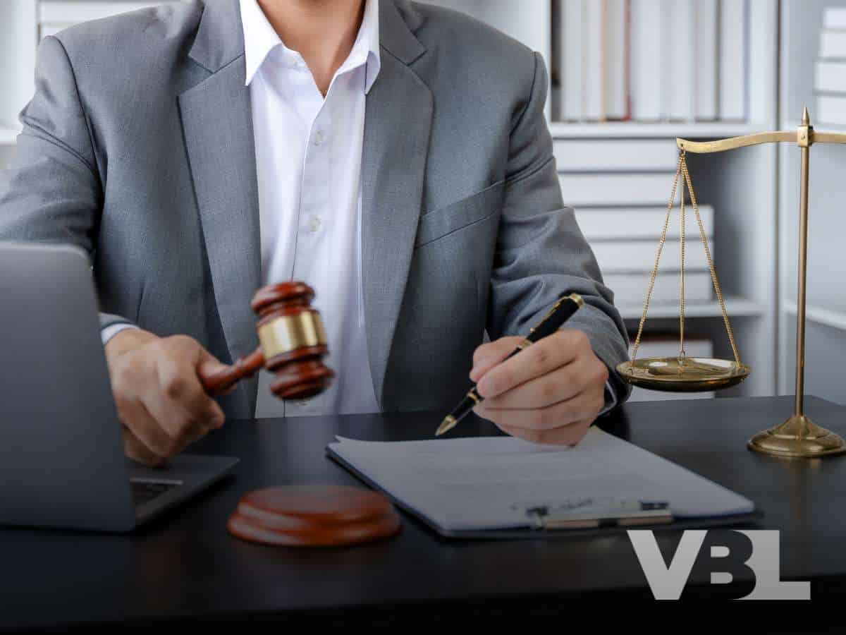 A lawyer reviewing documents with a gavel, symbolizing a Las Vegas Bankruptcy case.